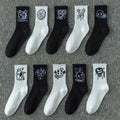 10 pairs of funny little devil pattern socks, casual and personalized, black and white colors suitable for various trendy occasi