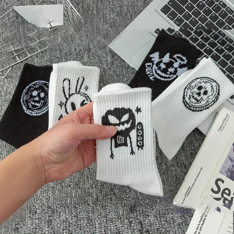10 pairs of funny little devil pattern socks, casual and personalized, black and white colors suitable for various trendy occasi