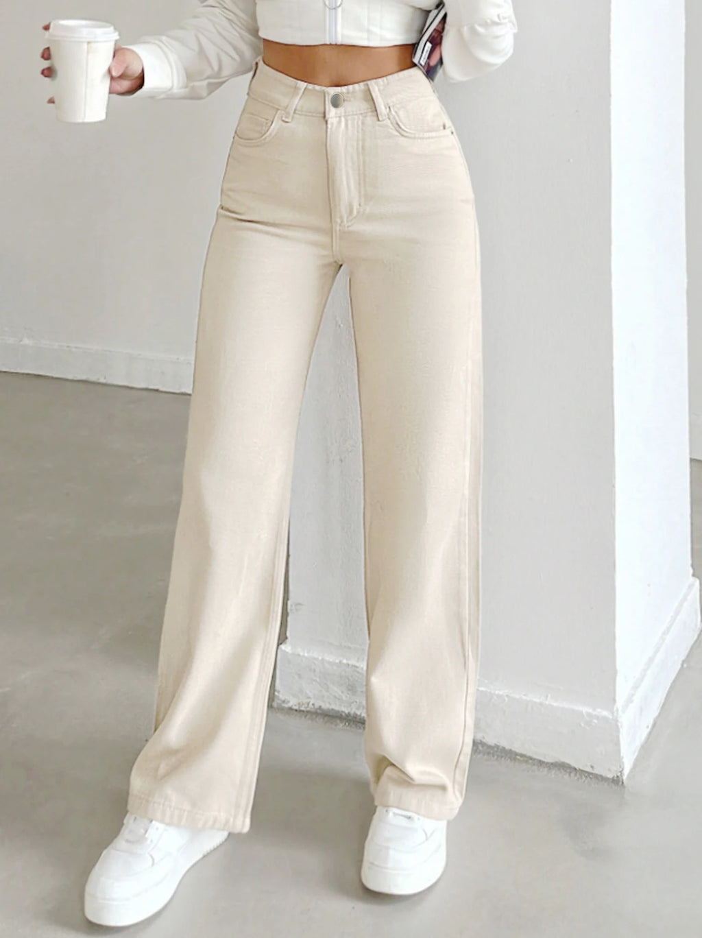 Women's autumn jeans, made of cotton denim, in a beige apricot color, straight-leg, slim fit, high-waisted, elastic waistband