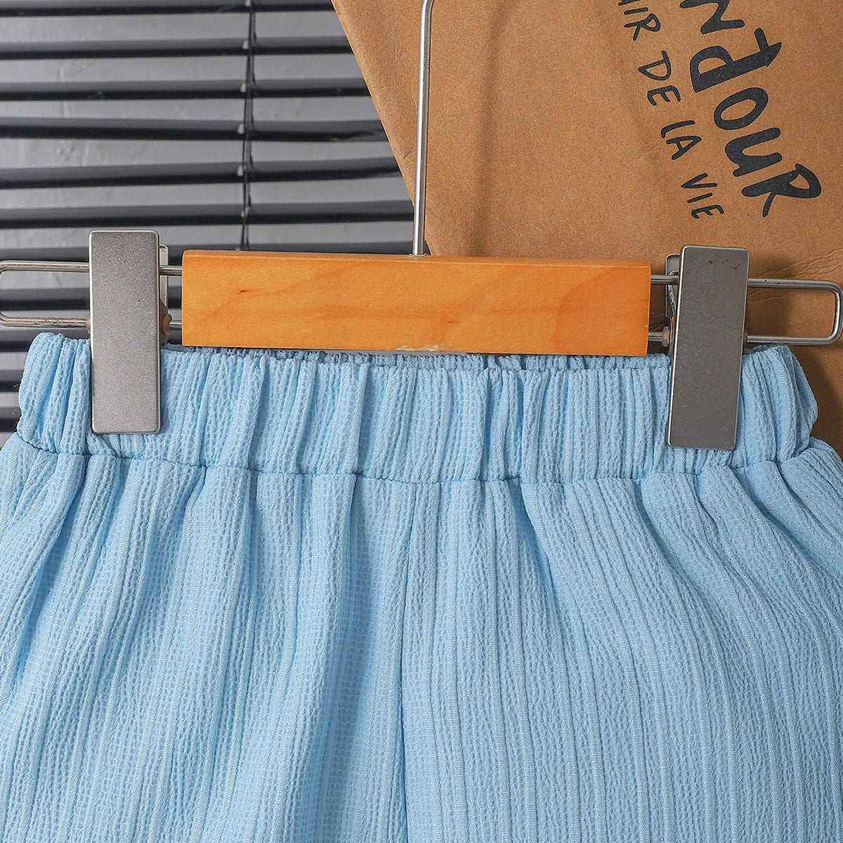 New summer men's short-sleeved woven pure blue button pocket + loose shorts two-piece set