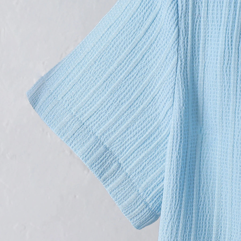New summer men's short-sleeved woven pure blue button pocket + loose shorts two-piece set