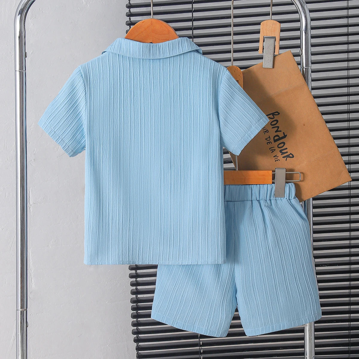 New summer men's short-sleeved woven pure blue button pocket + loose shorts two-piece set