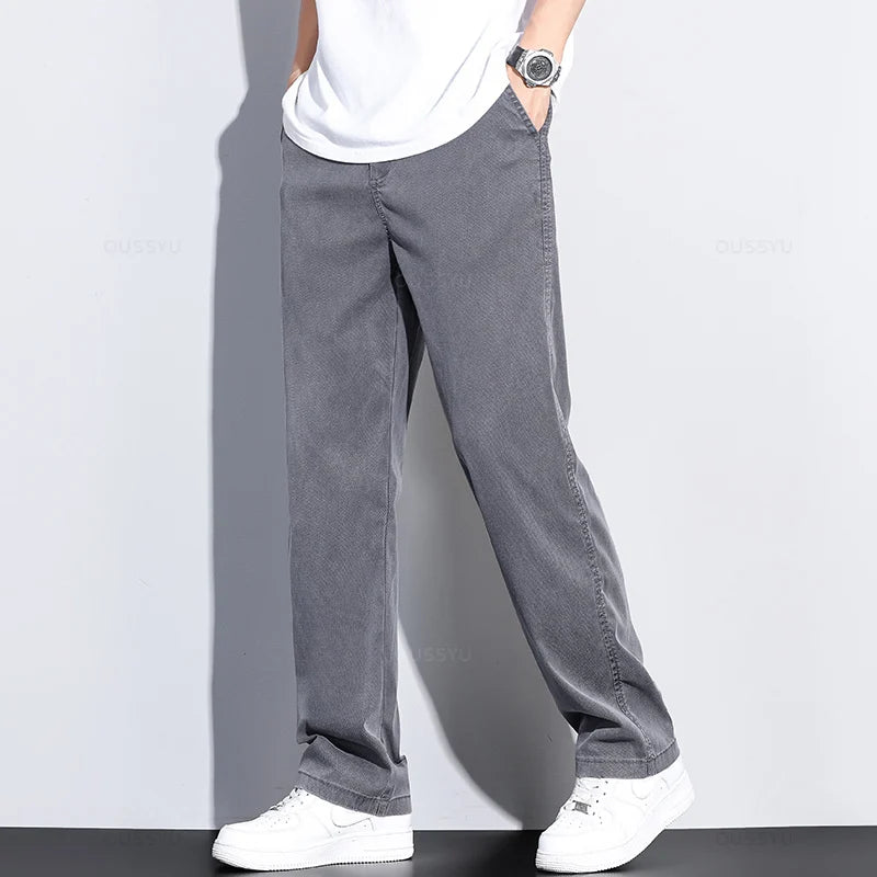 Brand Clothing Summer New Soft Lyocell Fabric Jeans Men Blue Elastic Waist Loose Straight Thin Denim Trousers Male Plus Size 5XL