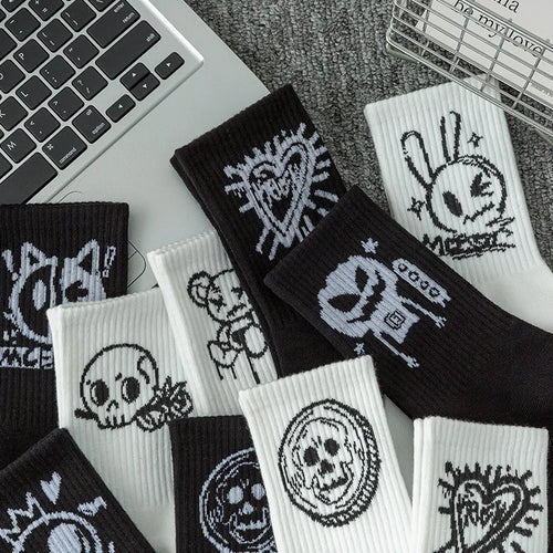 10 pairs of funny little devil pattern socks, casual and personalized, black and white colors suitable for various trendy occasi